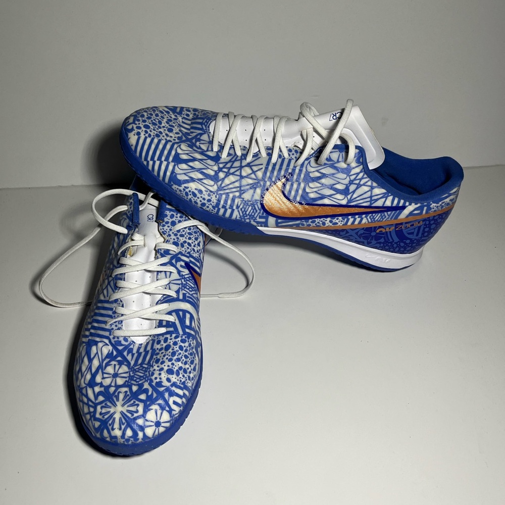 Nike Men's Blue White Athletic Shoes with Metallic Orange Swoosh
